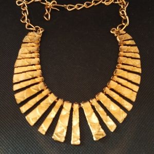 Gold tone, textured necklace
